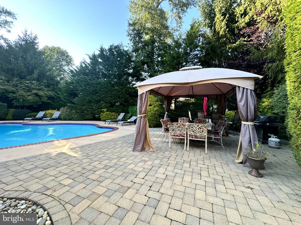 3 Bridgewater Road Farmingdale, NJ 07727 - Photo 45 of 65 Outdoor bar and chairs included