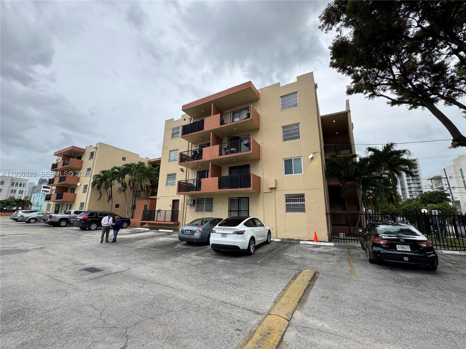 677 Southwest 9th Avenue, Unit 212 Miami, FL 33130 - Photo 17 of 19 a car parked in front of a building