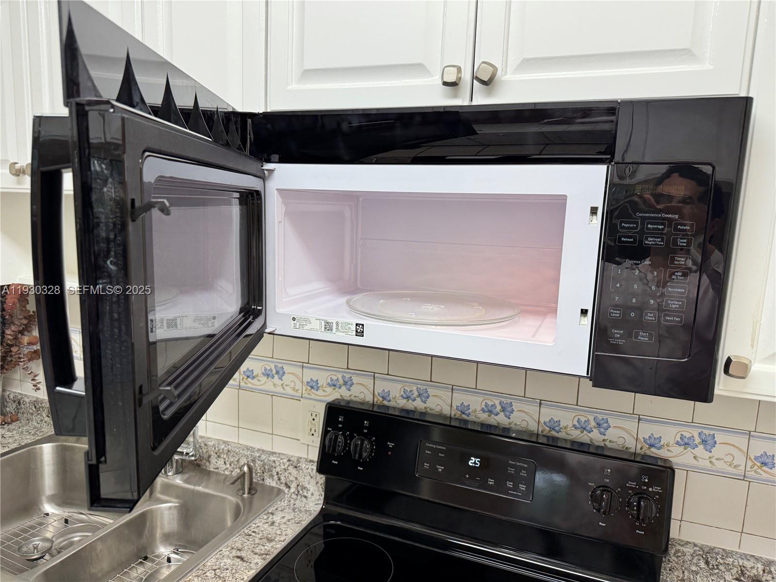 677 Southwest 9th Avenue, Unit 212 Miami, FL 33130 - Photo 8 of 19 a close view of a stove