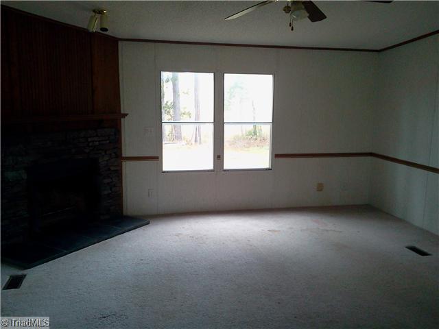 6839 Woody Ridge Road Snow Camp, NC 27349 - Photo 4 of 5 Living Room.