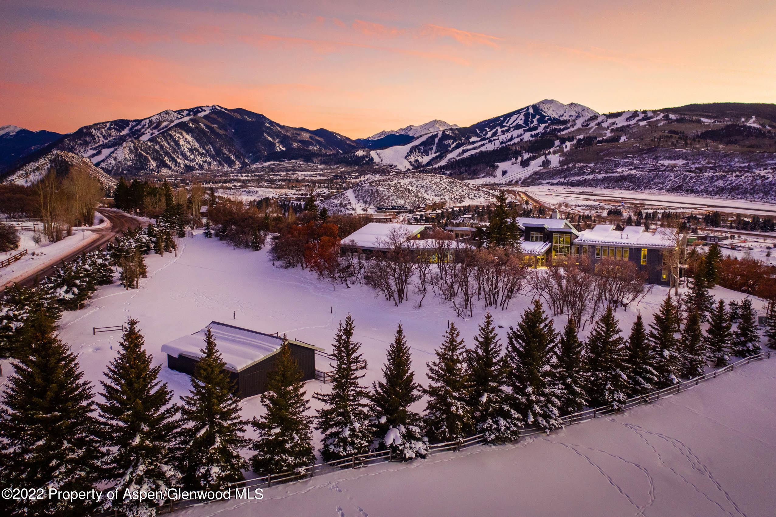 a view of a houses with a mountain