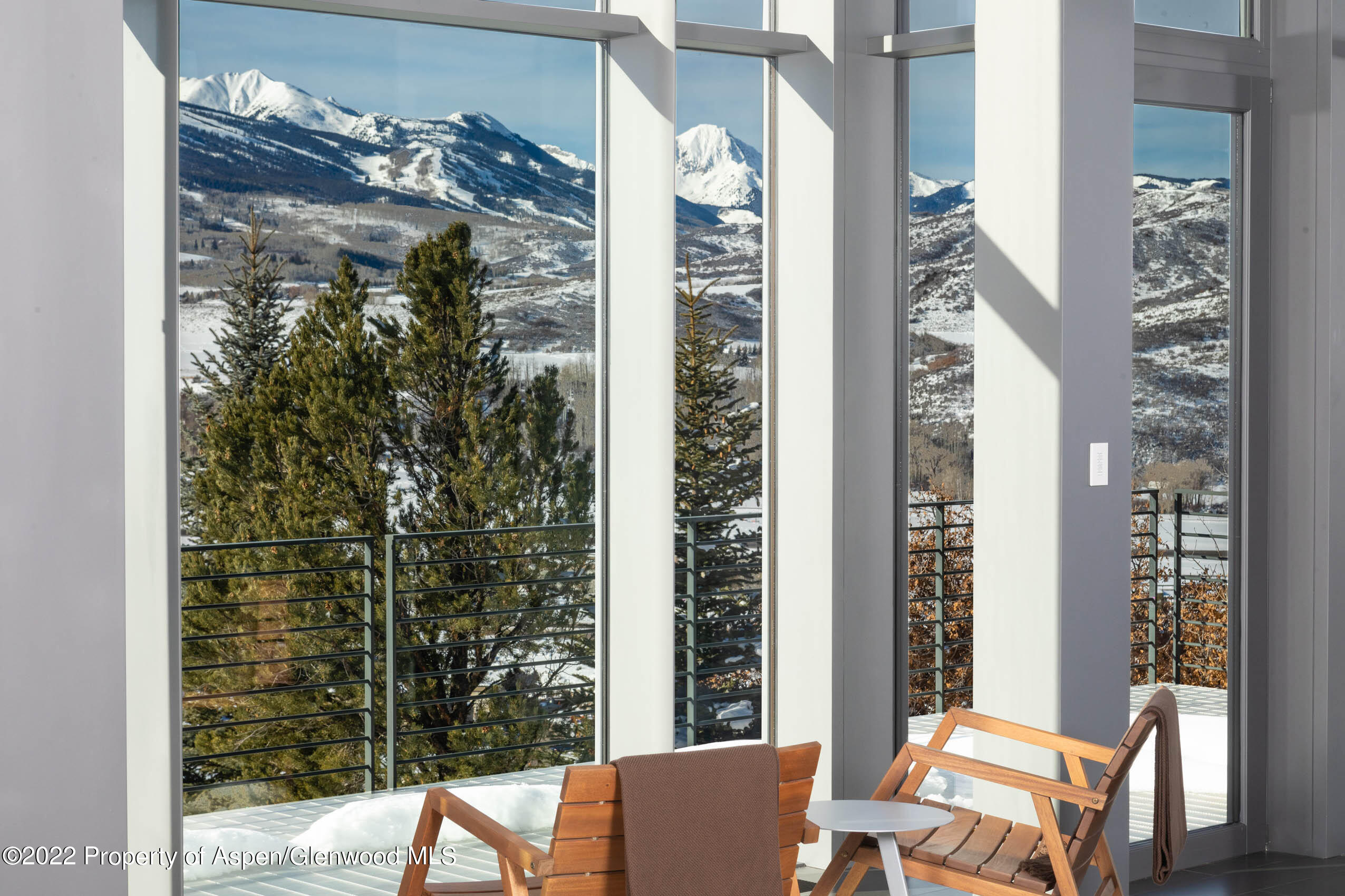 2780 McLain Flats Road Aspen, CO 81612 - Photo 15 of 46 a view of a balcony with chairs