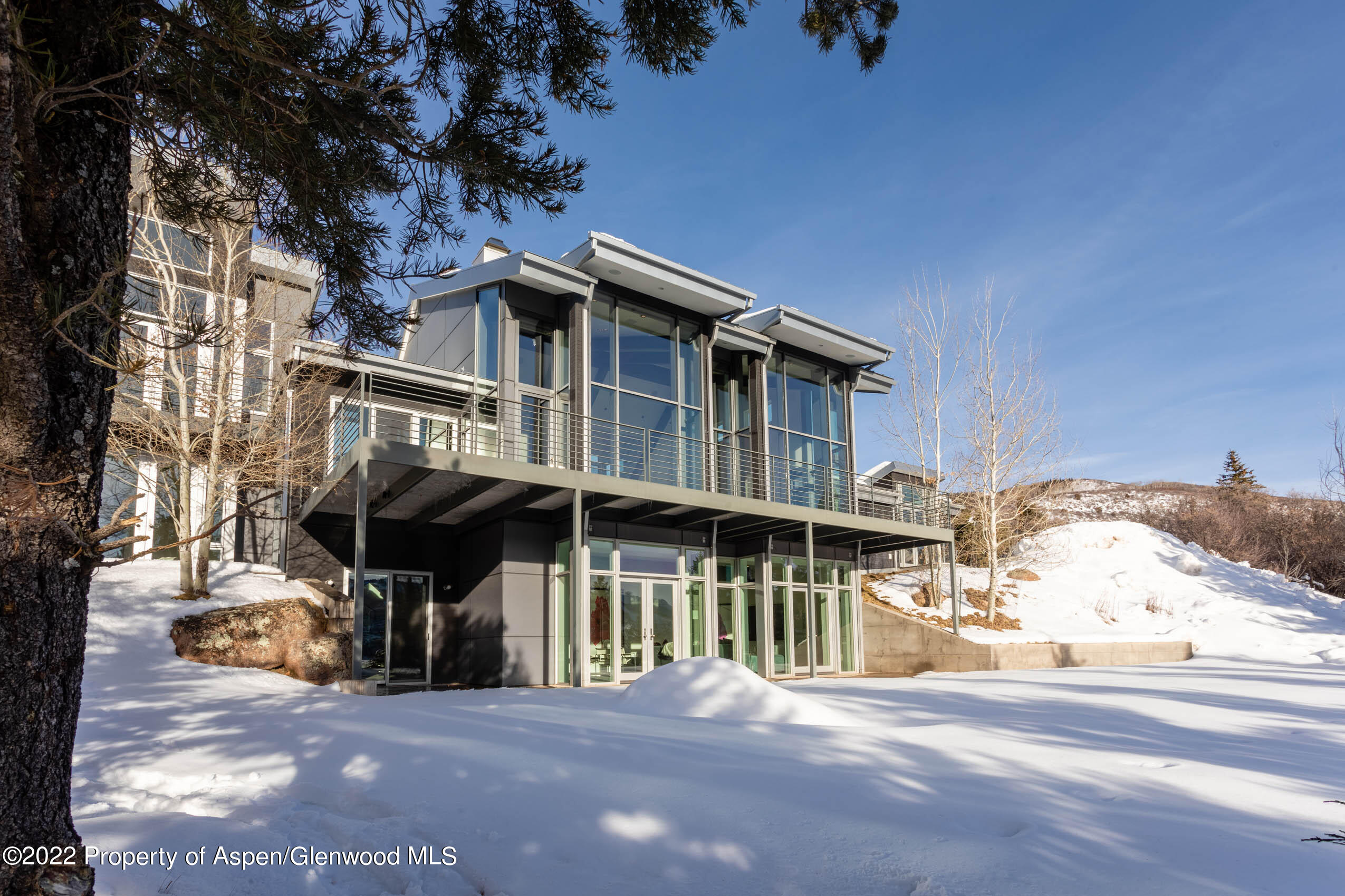 2780 McLain Flats Road Aspen, CO 81612 - Photo 26 of 46 a view of a house with a patio