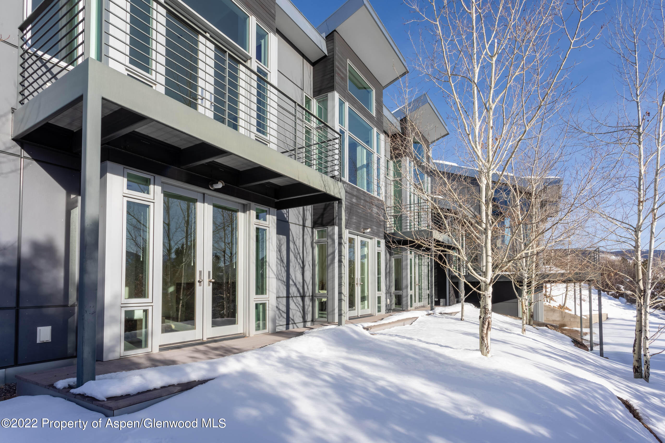 2780 McLain Flats Road Aspen, CO 81612 - Photo 28 of 46 a view of a building with a street