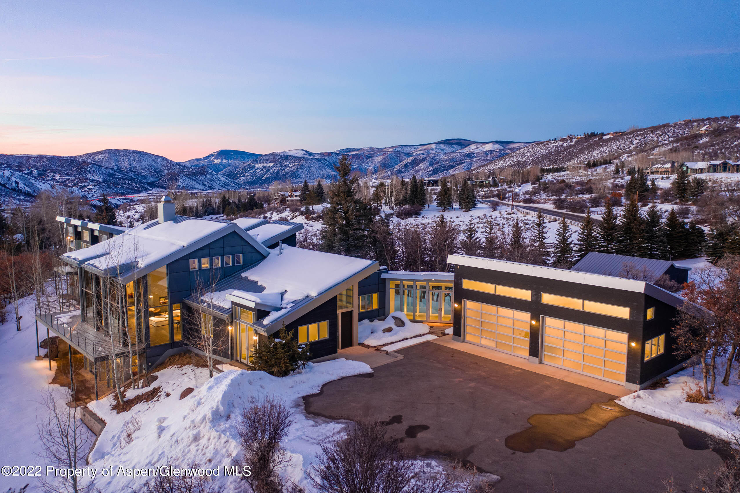 2780 McLain Flats Road Aspen, CO 81612 - Photo 3 of 46 a view of a houses with a terrace