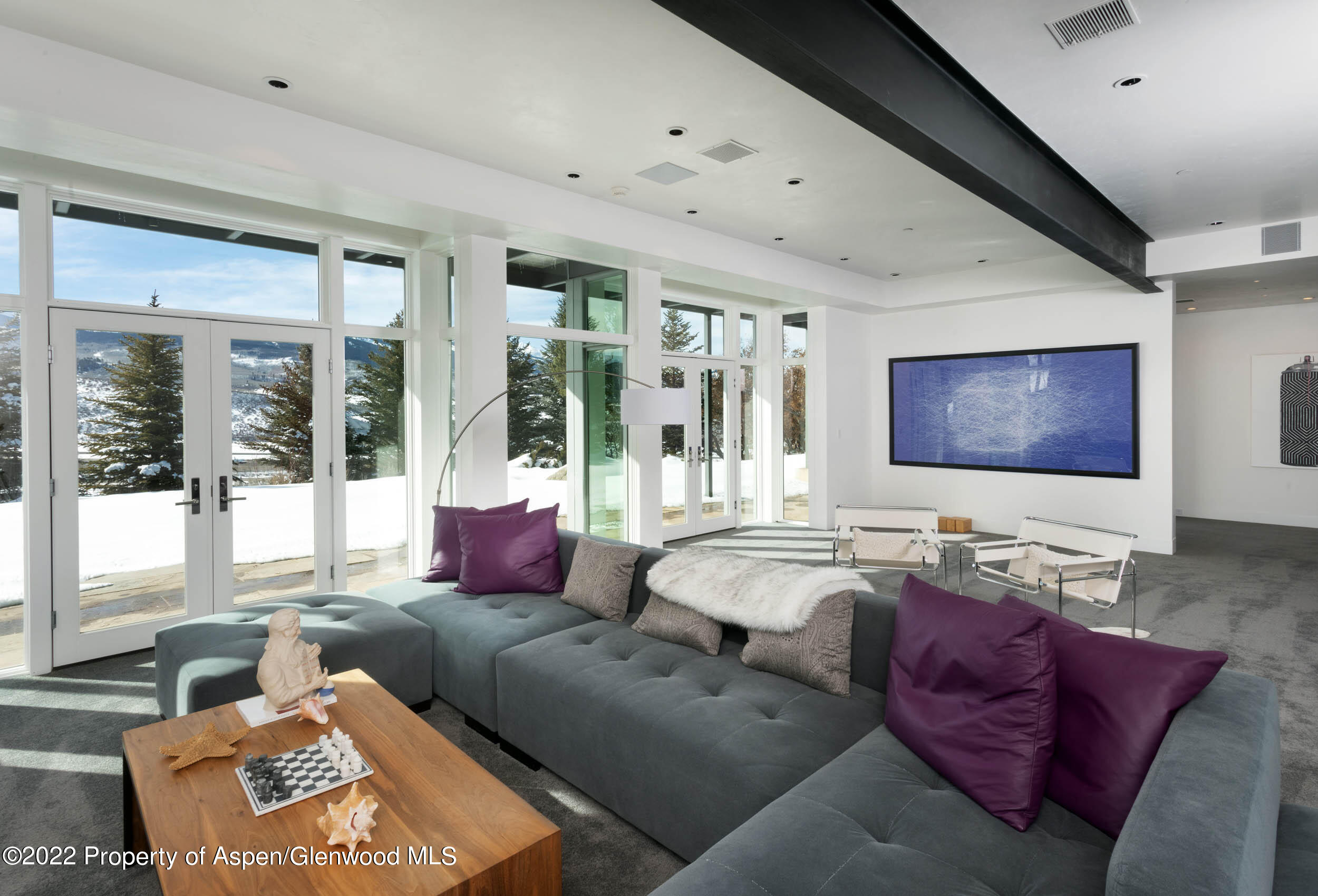 2780 McLain Flats Road Aspen, CO 81612 - Photo 35 of 46 a living room with furniture and a large window