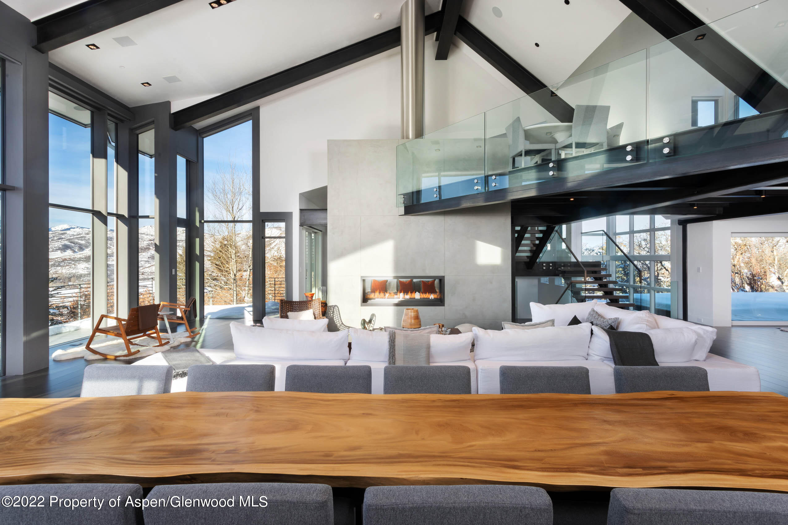 2780 McLain Flats Road Aspen, CO 81612 - Photo 6 of 46 a living room with stainless steel appliances granite countertop furniture and a large window