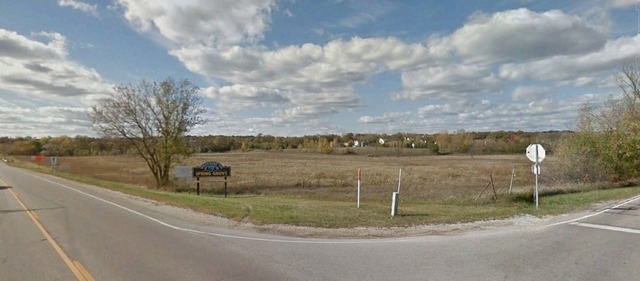 1154 Route 173 Spring Grove, IL 60081 - Photo 6 of 8 a view of a lake from a yard
