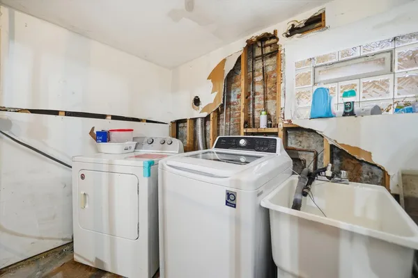 a utility room with dryer and washer