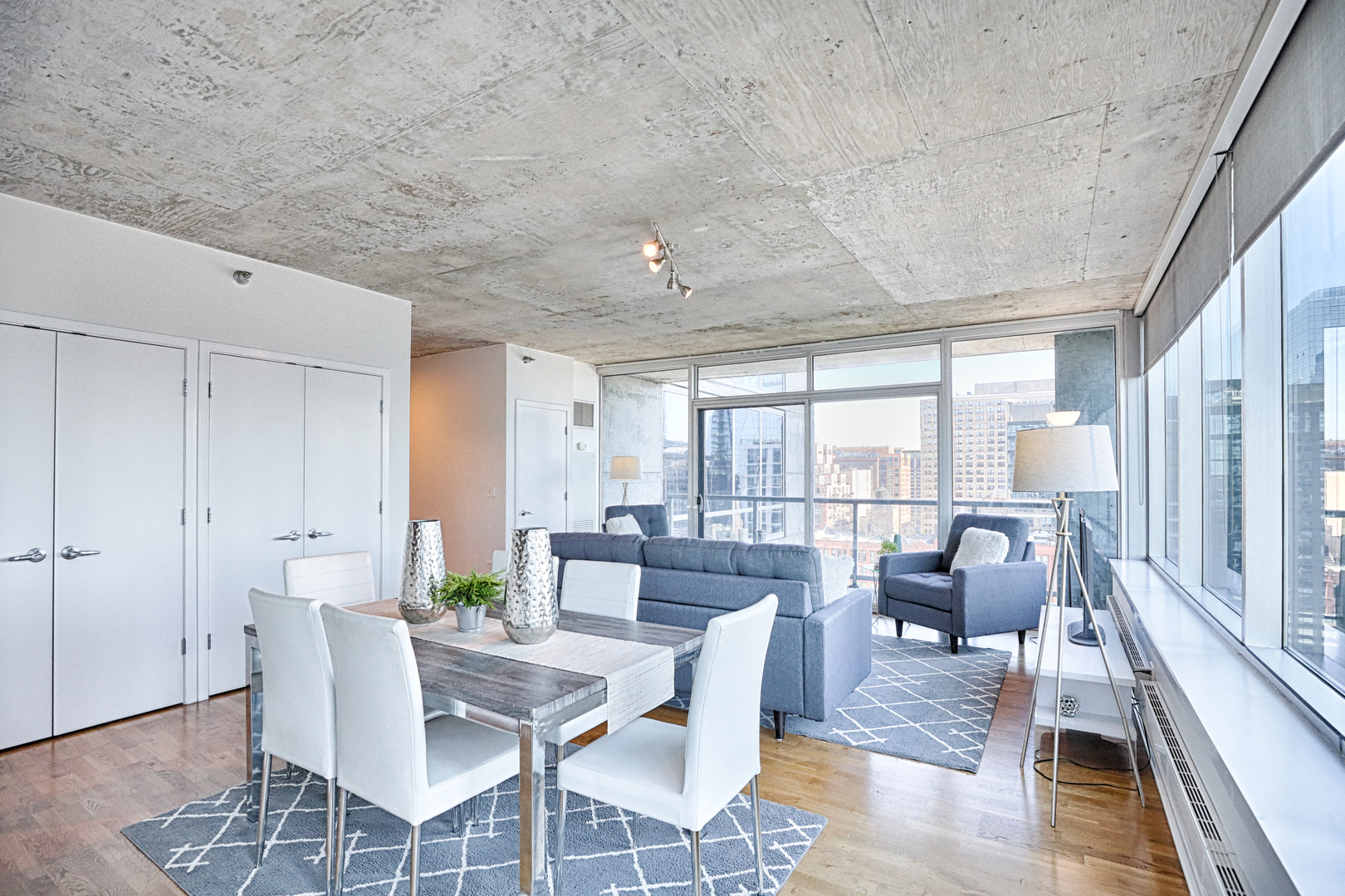 611 South Wells Street, Unit 1507 Chicago, IL 60607 - Photo 5 of 20 a view of a dining room with furniture window and outside view