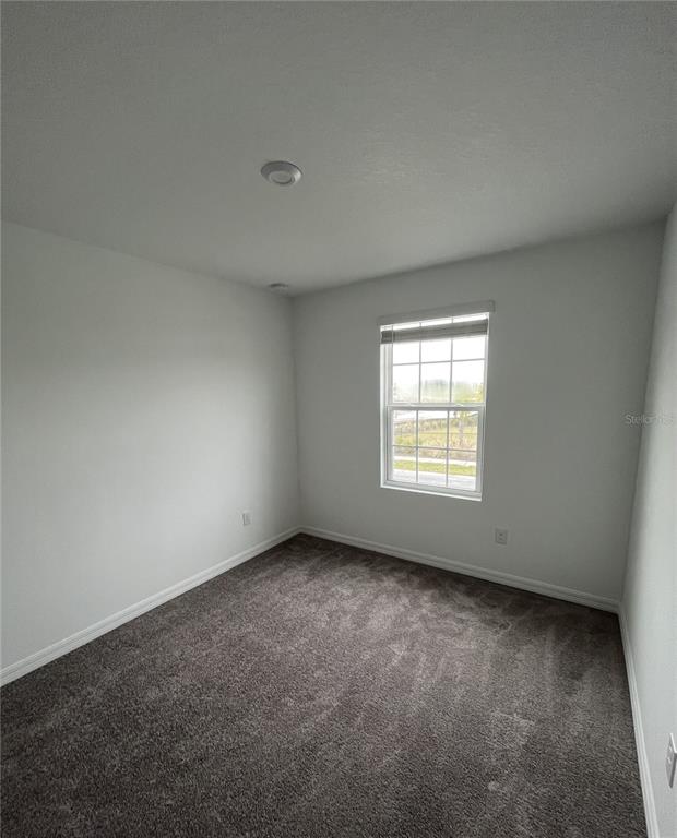 34142 Polacca Lane Wesley Chapel, FL 33543 - Photo 13 of 30 an empty room with a window