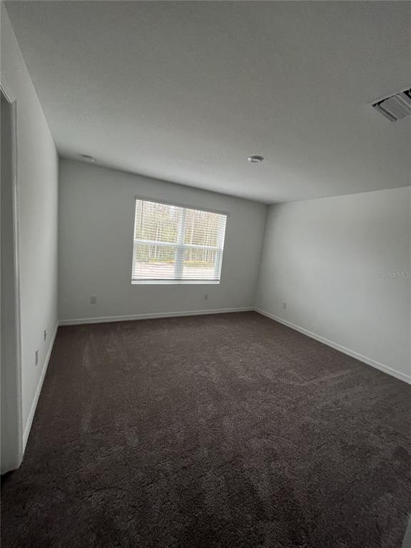 34142 Polacca Lane Wesley Chapel, FL 33543 - Photo 20 of 30 an empty room with a window