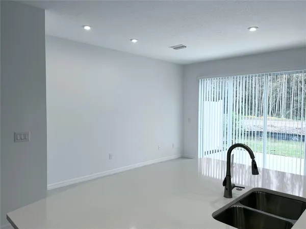 a close view of a sink and a faucet in a room