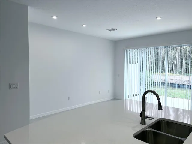 a close view of a sink and a faucet in a room