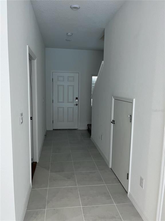 34142 Polacca Lane Wesley Chapel, FL 33543 - Photo 8 of 30 a view of a hallway