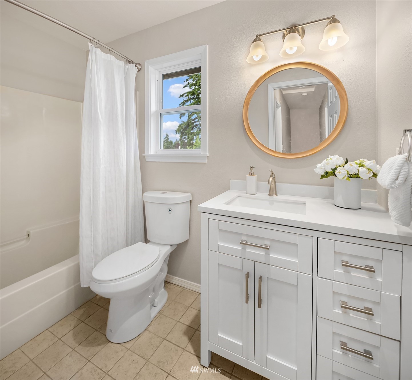 9009 Northeast 138th Place Kirkland, WA 98034 - Photo 22 of 30 a bathroom with a sink toilet and a mirror