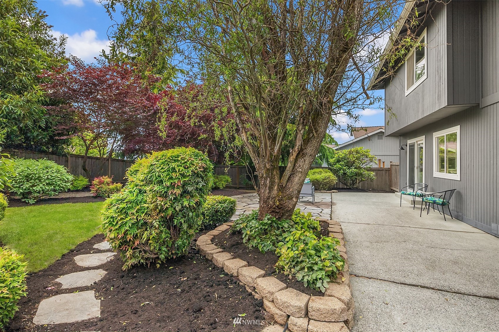 9009 Northeast 138th Place Kirkland, WA 98034 - Photo 27 of 30 a pathway of a house with a yard