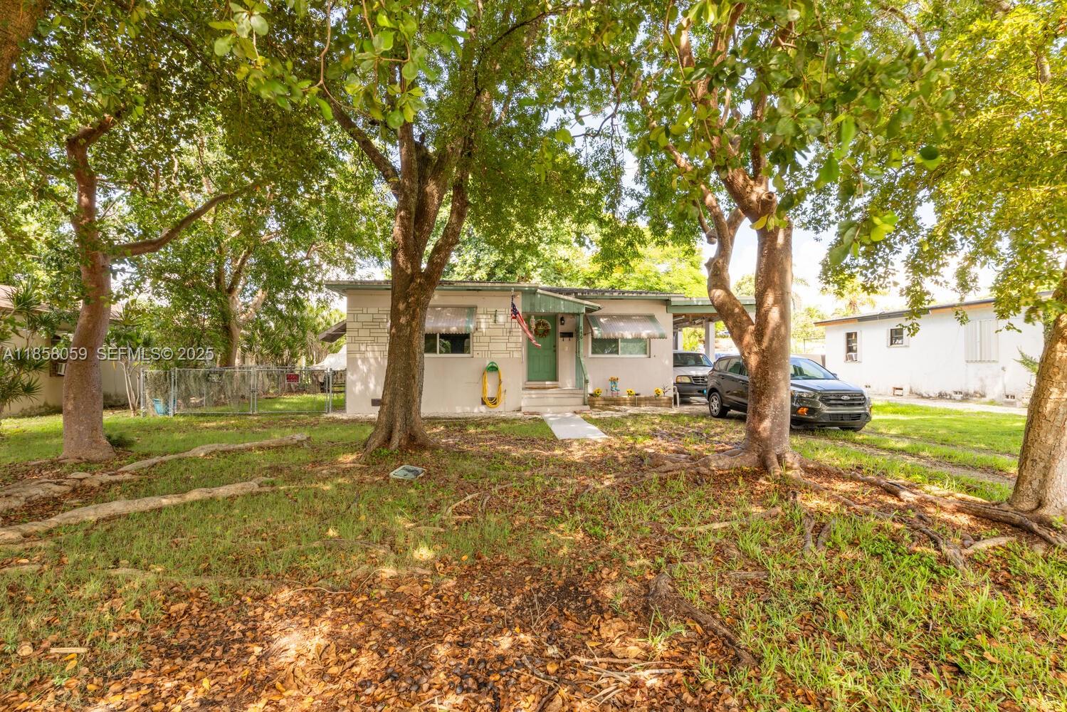 846 Northwest 3rd Avenue Homestead, FL 33030 - Photo 6 of 13 a view of a house with a yard