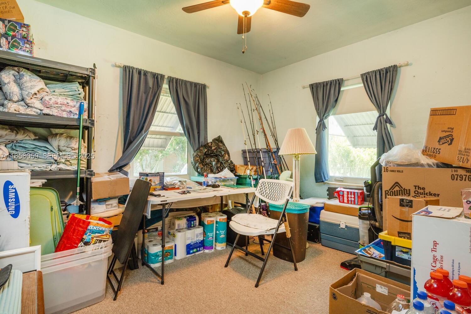 846 Northwest 3rd Avenue Homestead, FL 33030 - Photo 10 of 13 a living room with furniture and a window