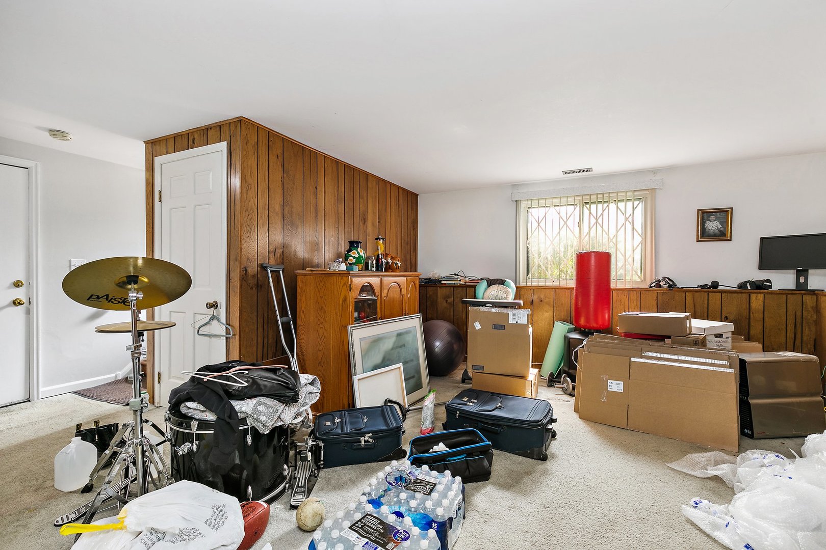 114 Sherman Street Bartlett, IL 60103 - Photo 12 of 17 a view of a workspace with furniture and a livingroom
