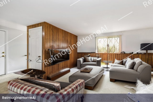 114 Sherman Street Bartlett, IL 60103 - Photo 13 of 17 a living room with furniture ceiling fan and a window
