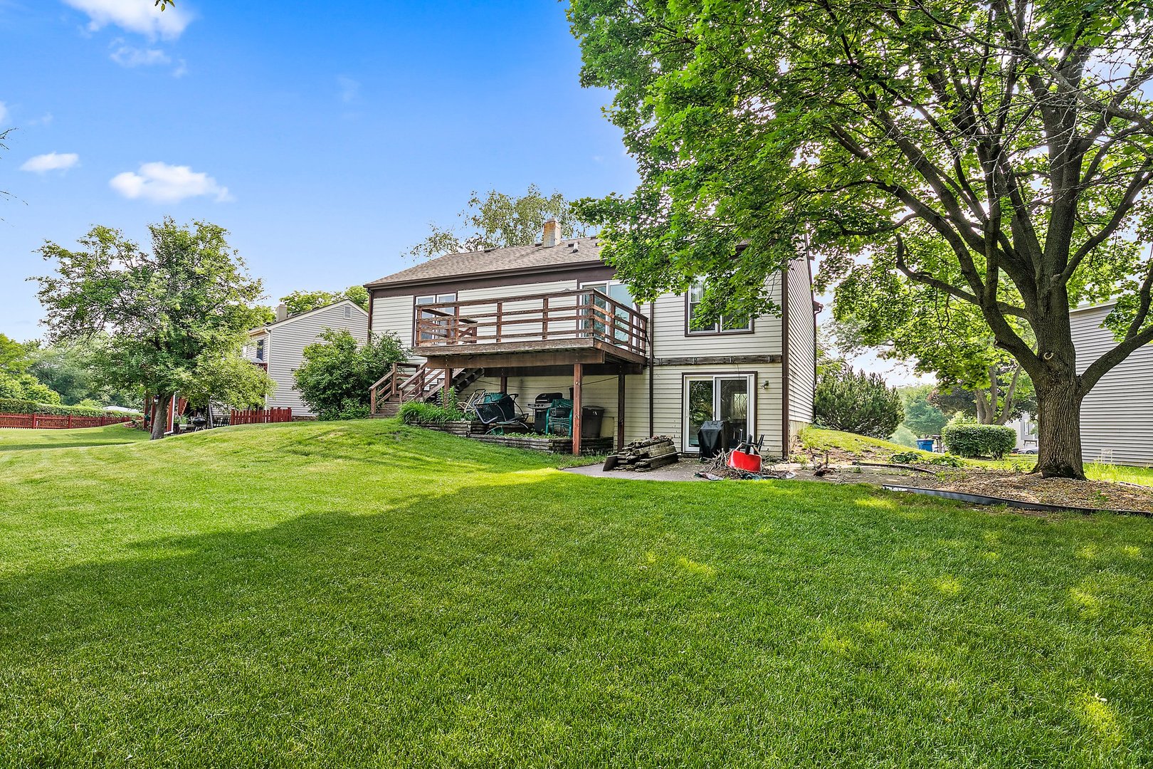 114 Sherman Street Bartlett, IL 60103 - Photo 17 of 17 a view of an house with backyard space and garden