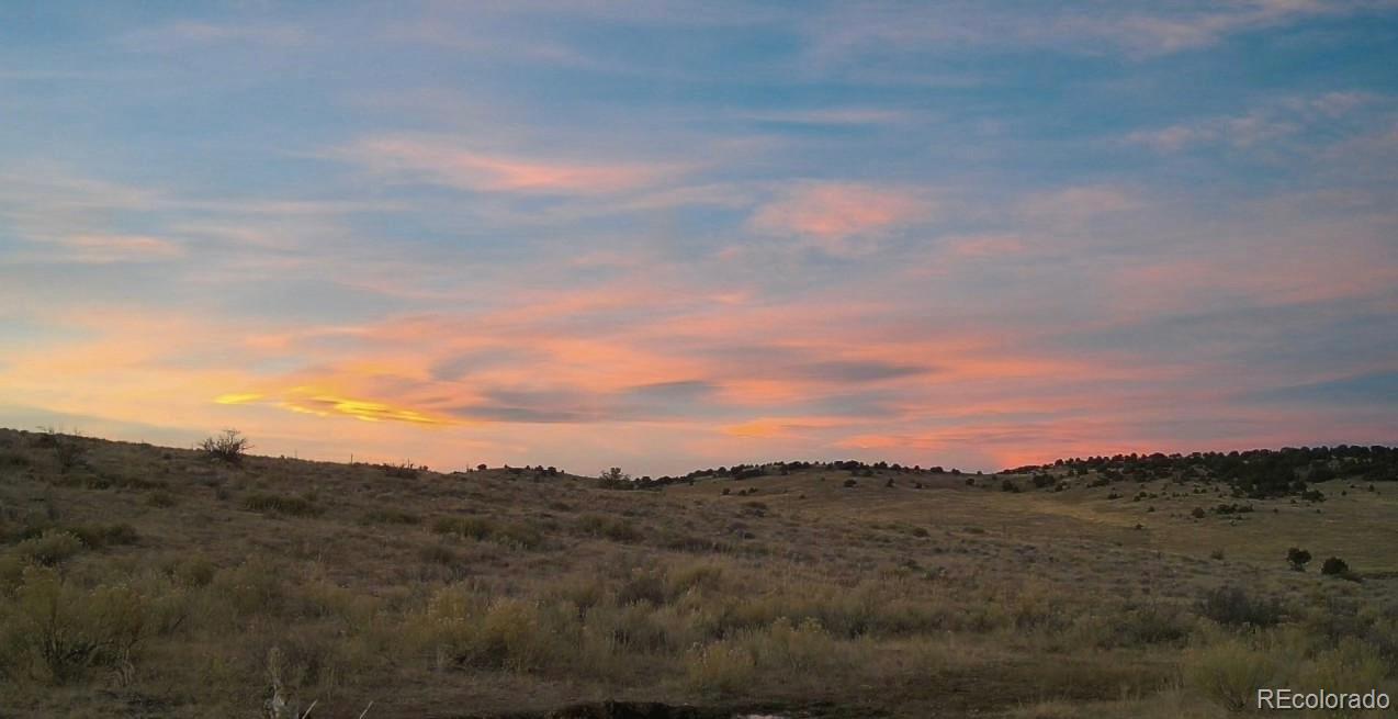 Airport Road Westcliffe, CO 81252 - Photo 2 of 19 a view of a mountain range with lush green forest