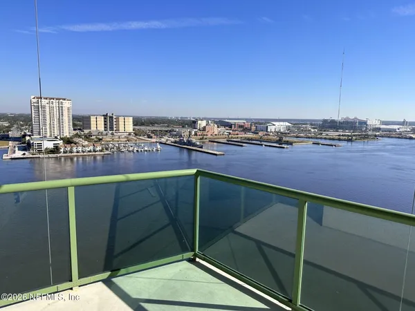 a view of a swimming pool with a terrace