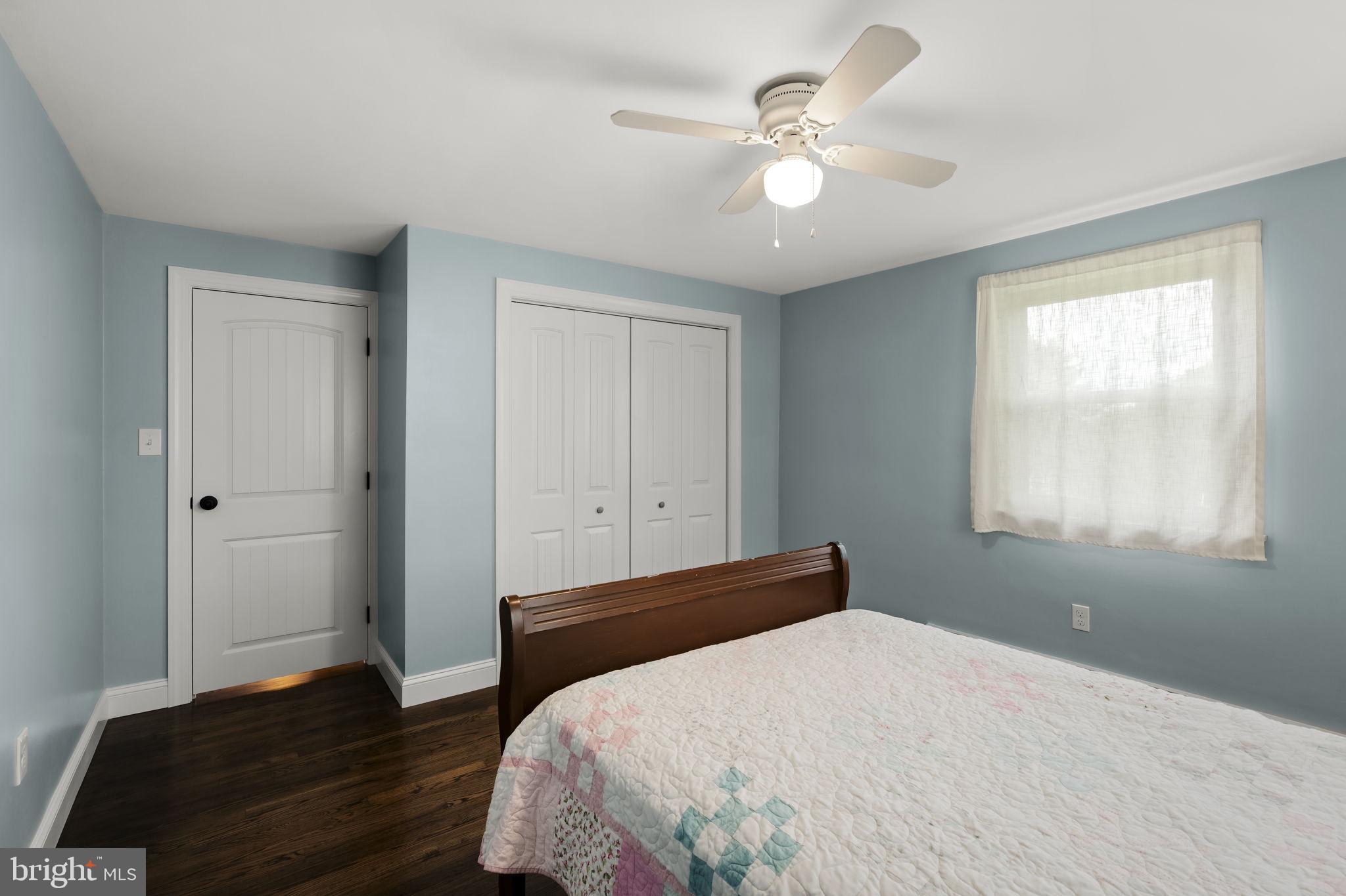1160 Narvon Road Narvon, PA 17555 - Photo 40 of 64 a bedroom with a bed and a chandelier