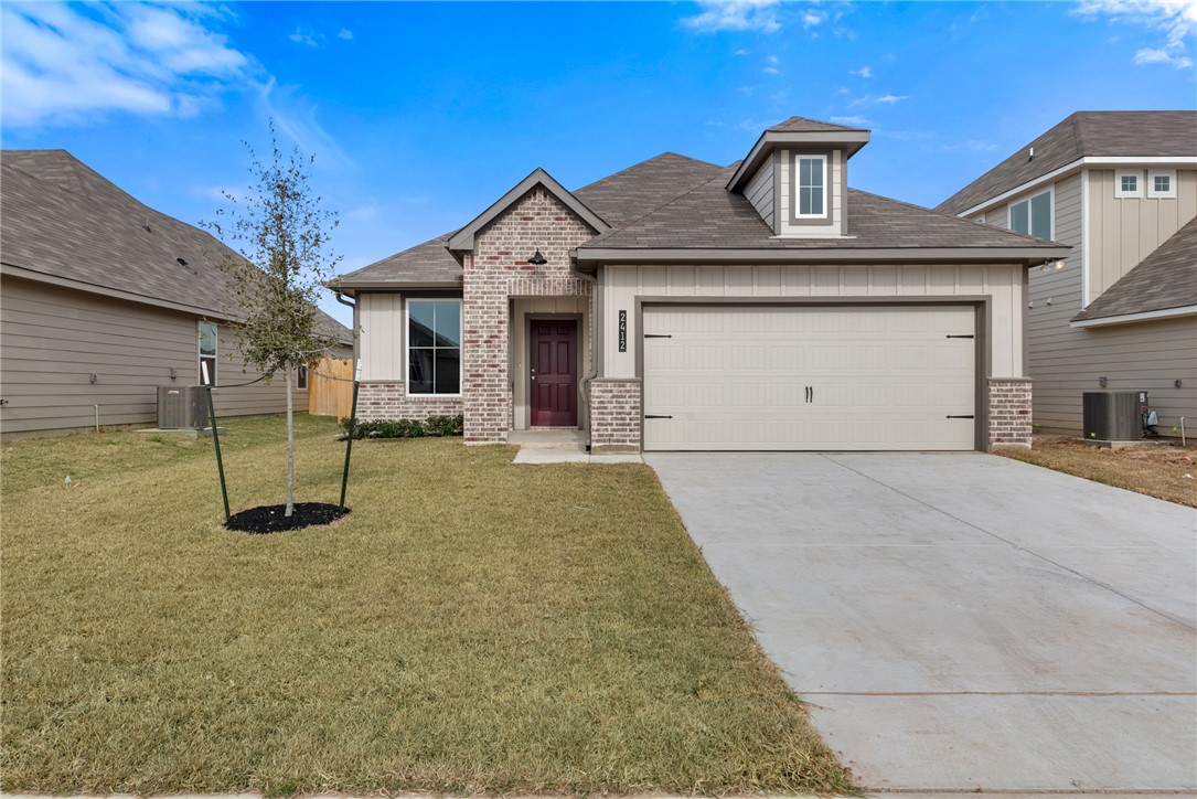 2412 Rooke Road Bryan, TX 77807 - Photo 2 of 35 a view of a house with a backyard