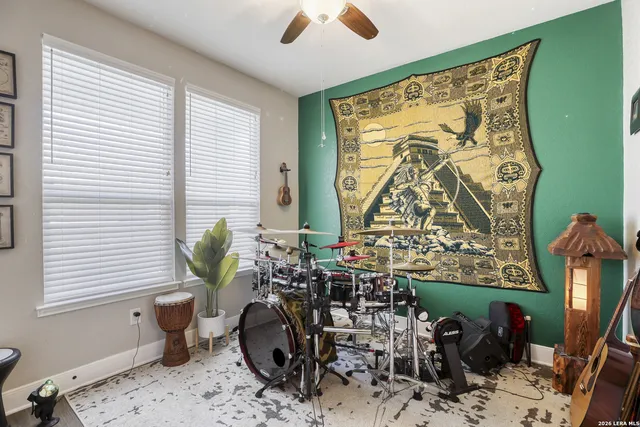 a room with furniture and a large window