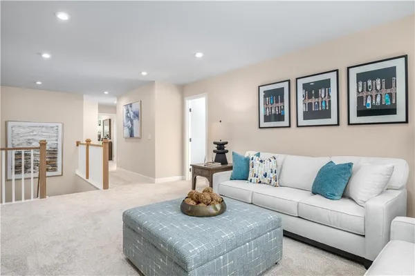 a living room with furniture and a table