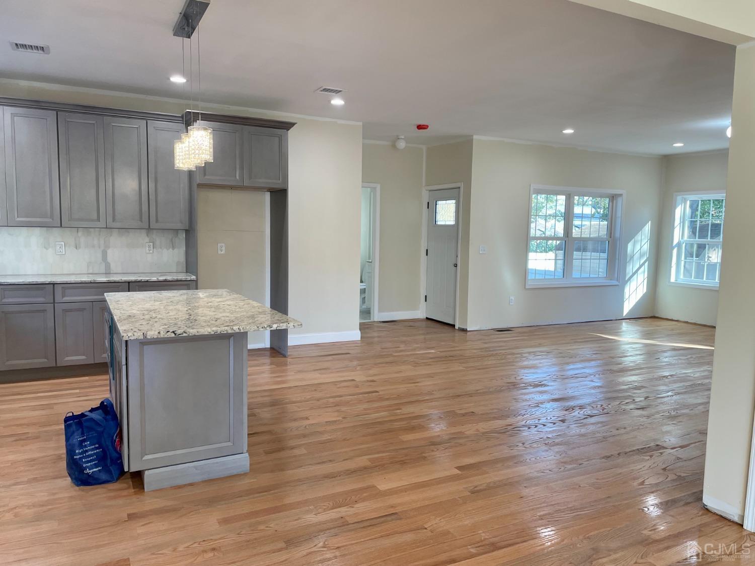 125 Ridge Road Colonia, NJ 07067 - Photo 5 of 26 a view of kitchen with refrigerator and window