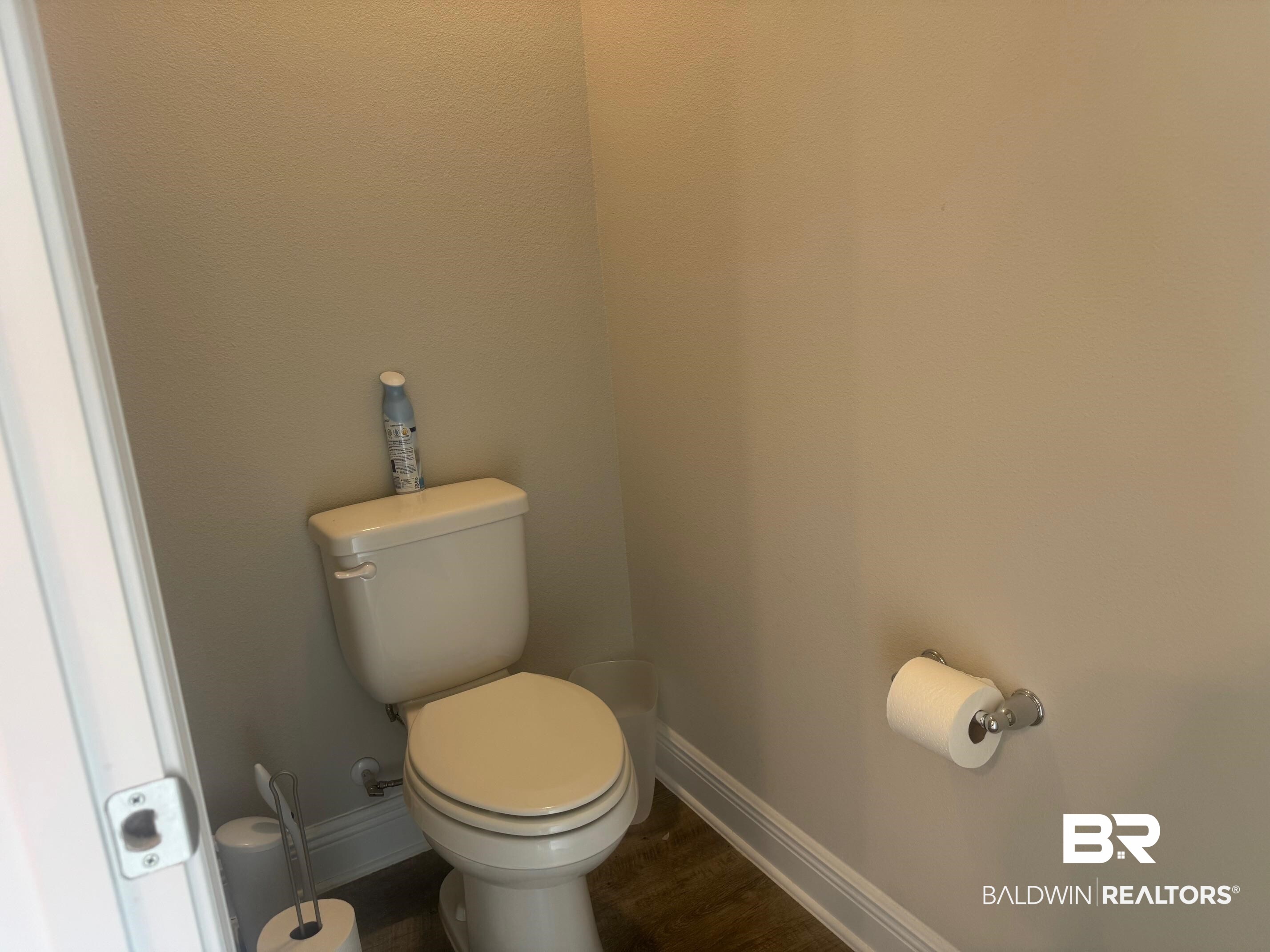 24903 Spectacular Bid Loop Daphne, AL 36526 - Photo 18 of 37 Bathroom featuring baseboards and wood finished floors