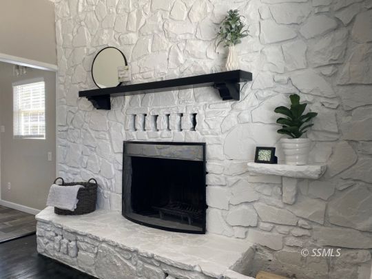 416 North Helena Street Ridgecrest, CA 93555 - Photo 7 of 22 a living room with furniture and a fireplace