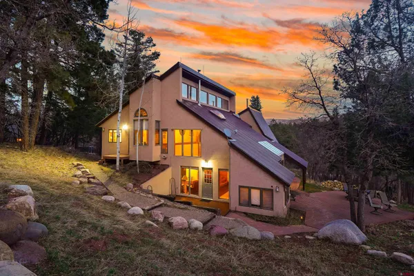 a view of a house with a street