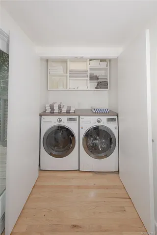 a utility room with dryer and washer