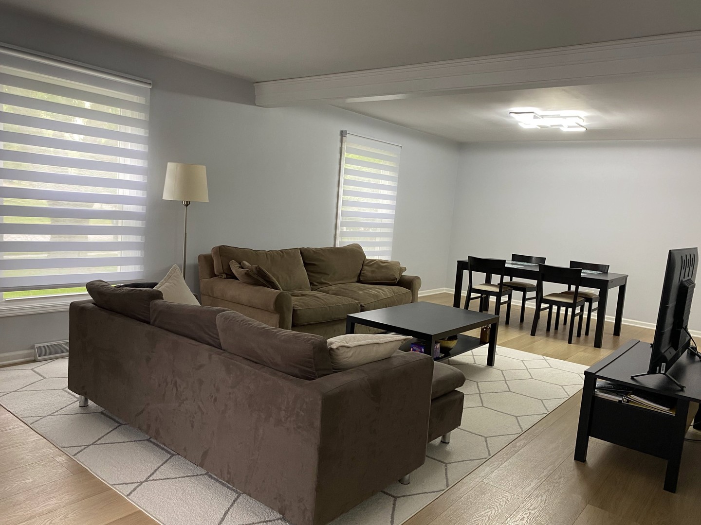 1408 Killdeer Drive Naperville, IL 60565 - Photo 16 of 43 a living room with furniture and a window