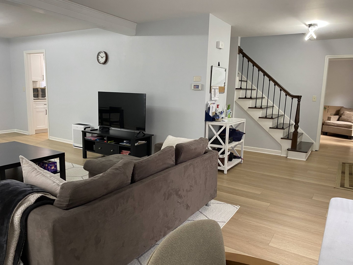 1408 Killdeer Drive Naperville, IL 60565 - Photo 18 of 43 a living room with furniture and a flat screen tv