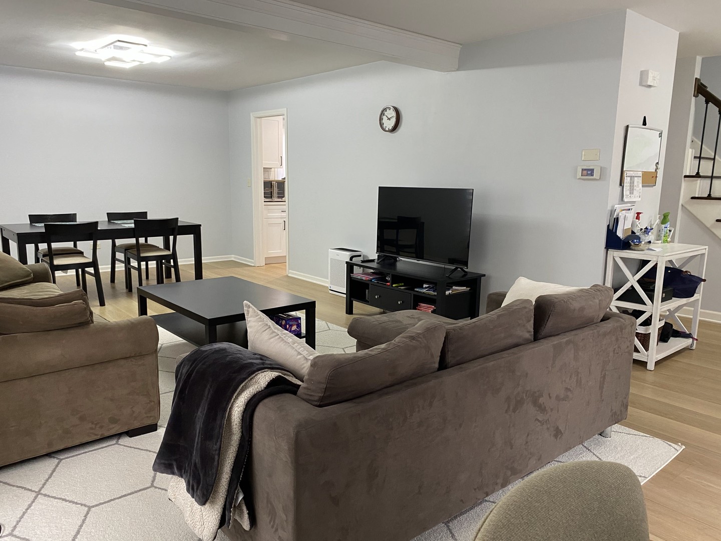 1408 Killdeer Drive Naperville, IL 60565 - Photo 19 of 43 a living room with furniture and a flat screen tv