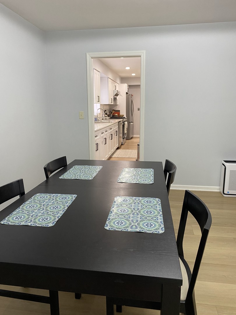 1408 Killdeer Drive Naperville, IL 60565 - Photo 22 of 43 a view of a dining room with furniture
