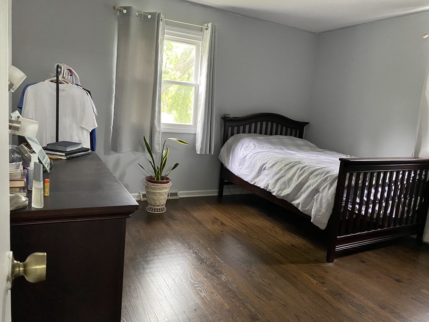 1408 Killdeer Drive Naperville, IL 60565 - Photo 26 of 43 a bedroom with bed and window