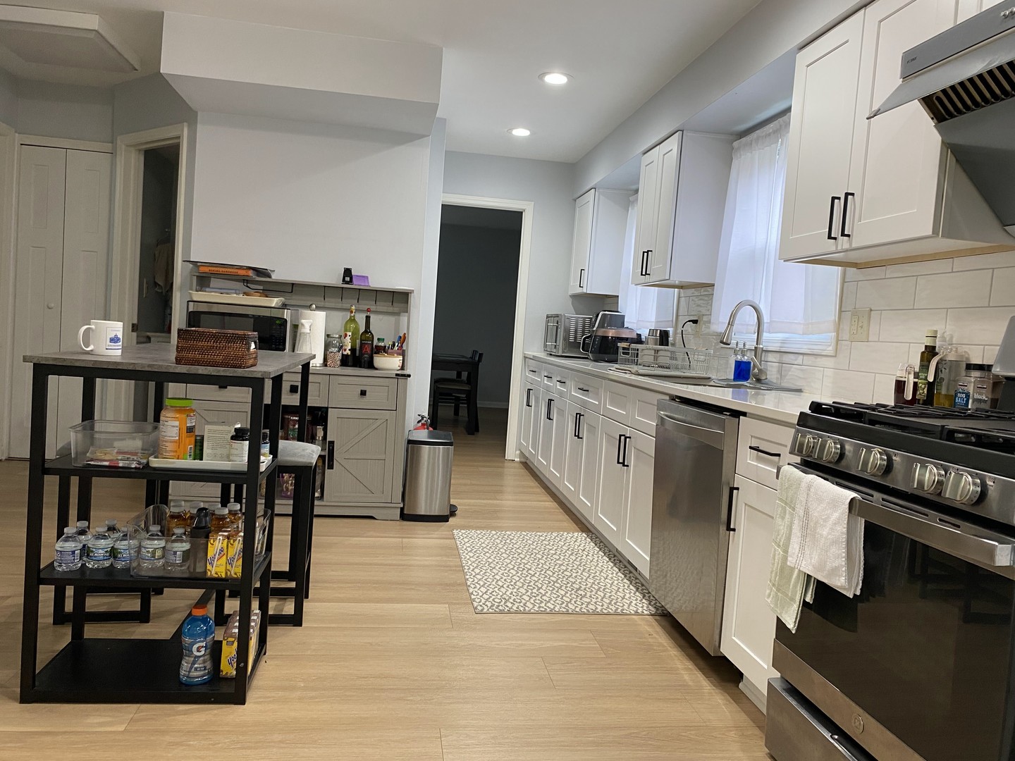 1408 Killdeer Drive Naperville, IL 60565 - Photo 10 of 43 a kitchen with stainless steel appliances granite countertop a stove and a refrigerator