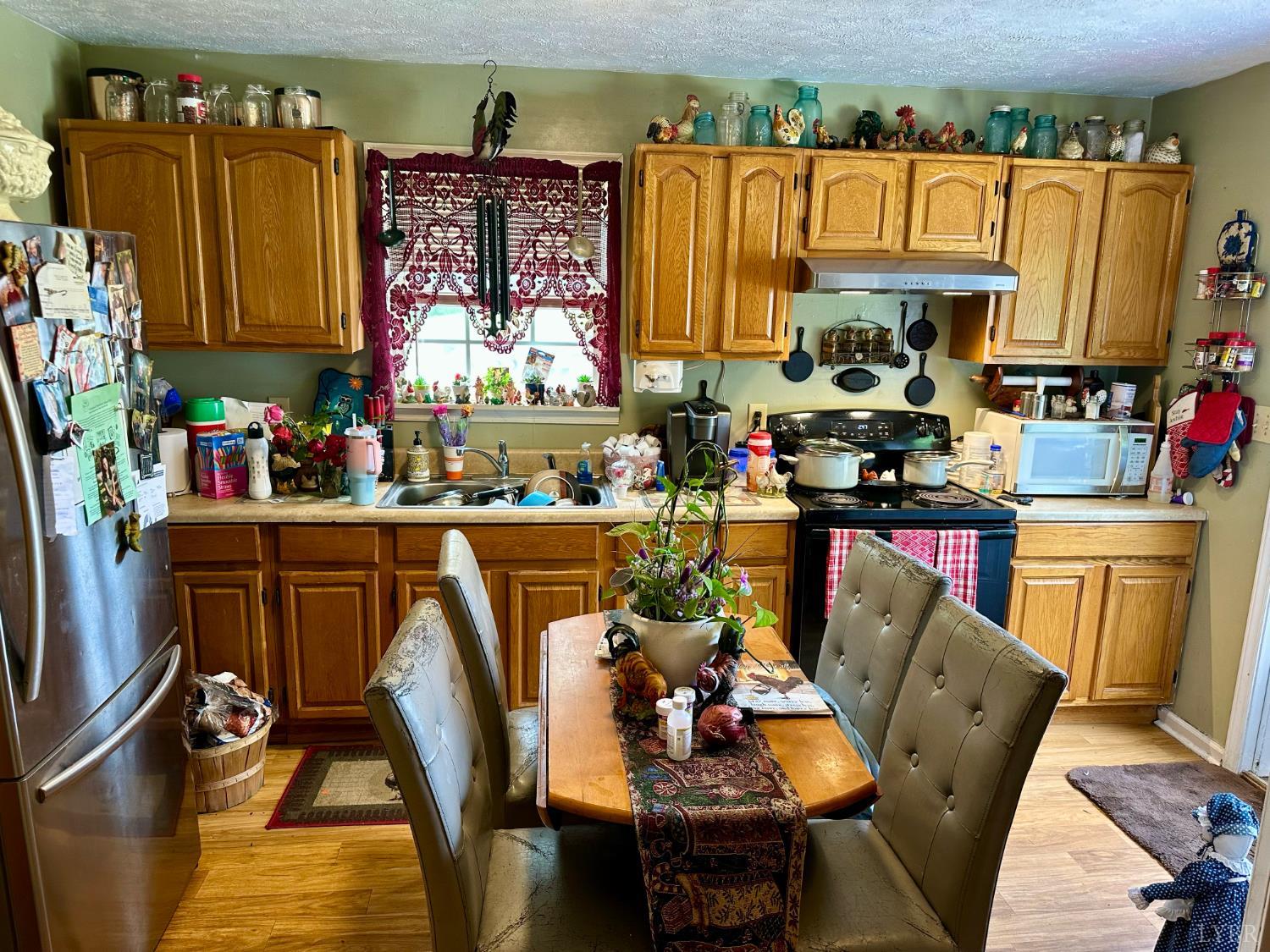 118 Claytor Road Brookneal, VA 24528 - Photo 13 of 26 a view of kitchen and dining area with furniture