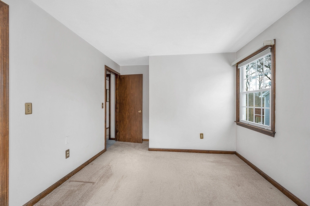 24 Benton Circle Reading, MA 01867 - Photo 23 of 41 an empty room with windows