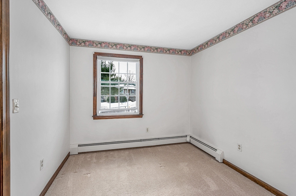 24 Benton Circle Reading, MA 01867 - Photo 24 of 41 a view of a room that has a window in it