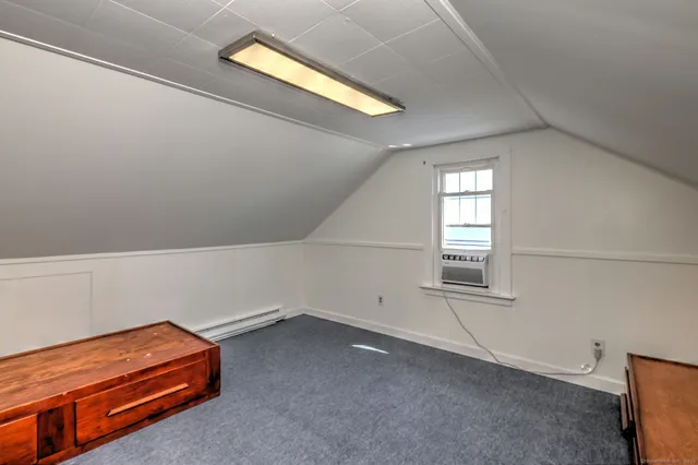 a view of a hallway with a window
