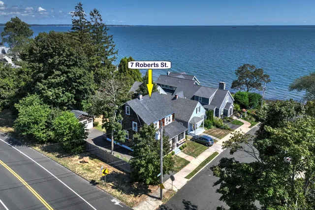 an aerial view of a house with a garden