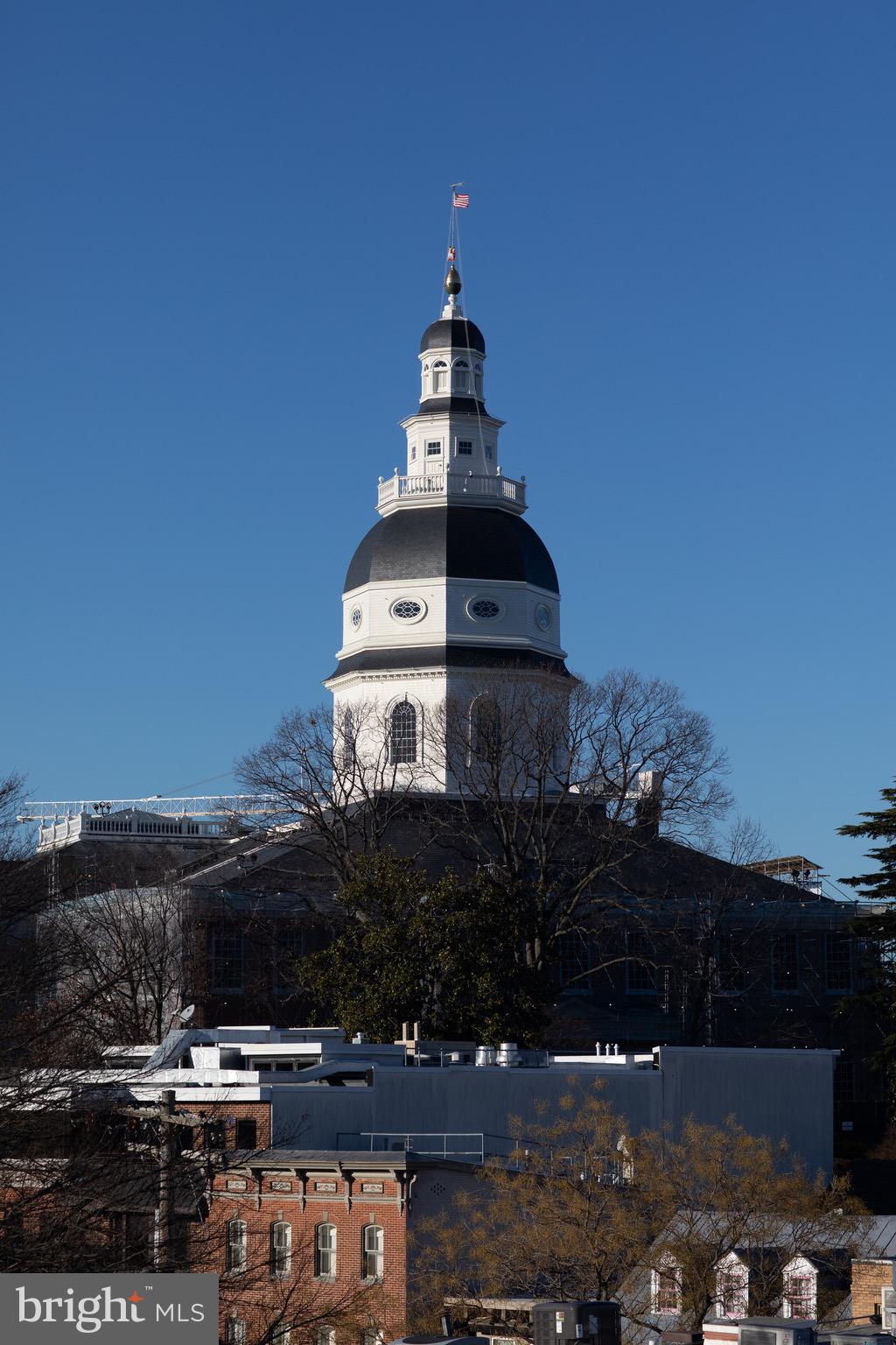 986 Breakwater Drive Annapolis, MD 21403 - Photo 28 of 31 a tall building with trees in the background