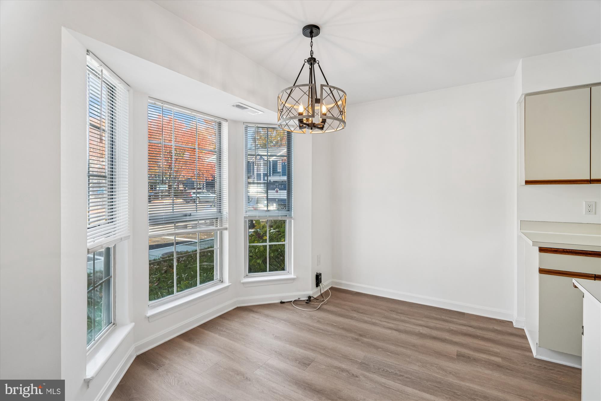 986 Breakwater Drive Annapolis, MD 21403 - Photo 3 of 31 a view of empty room with wooden floor and fan